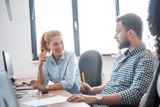 istock Business colleagues working in the office and brainstorming 1146098121
