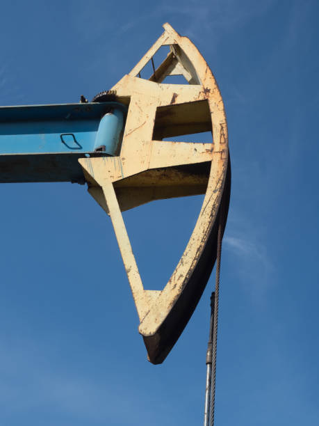 istock Oil pump against the blue sky 1146102559