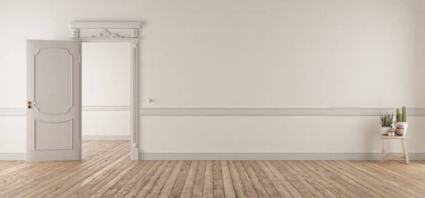 istock White living room in classic style with open door 1146103276