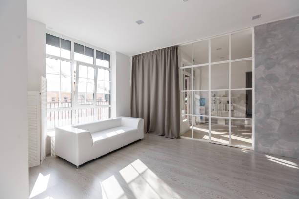 istock Horizontal view of white living room design 1146104265