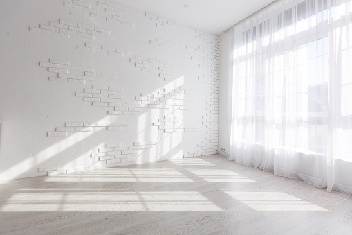 Blank white wall with window and concrete floor, mock up, 3d render