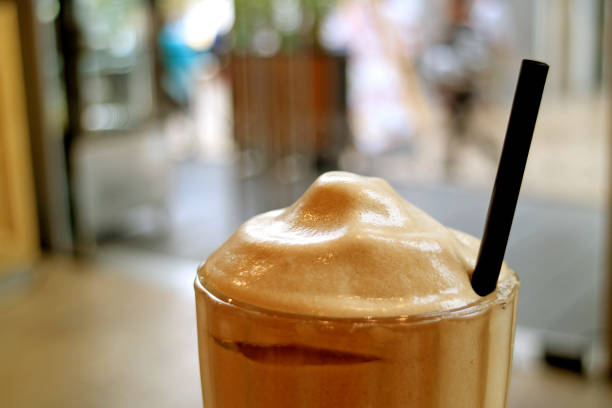 Closeup a Glass of Cold and Aromatic Frappe Coffee