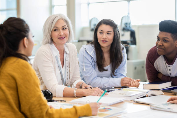 istock High school students enjoy discussion with teacher 1146107065