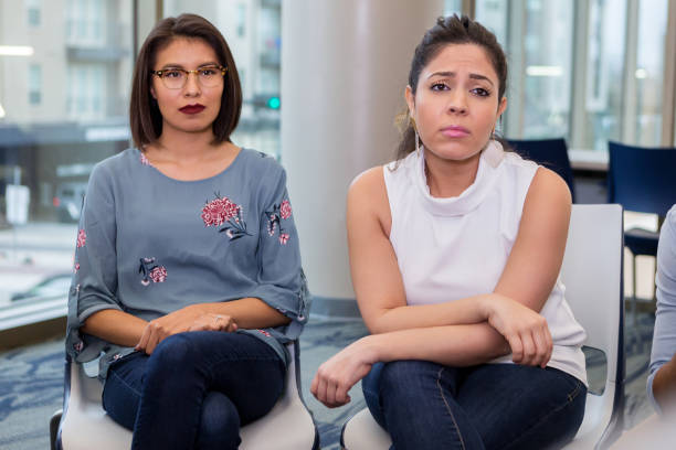 istock Two women show concern for a colleague 1146107141
