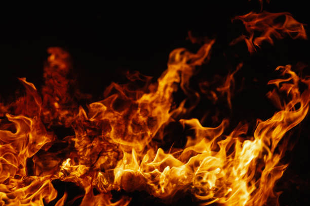 istock On fire. Themes of fire, disaster and extreme events. Background with copy space 1146108266
