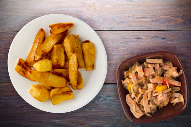 istock fry potatoes on a wooden background 1146110430