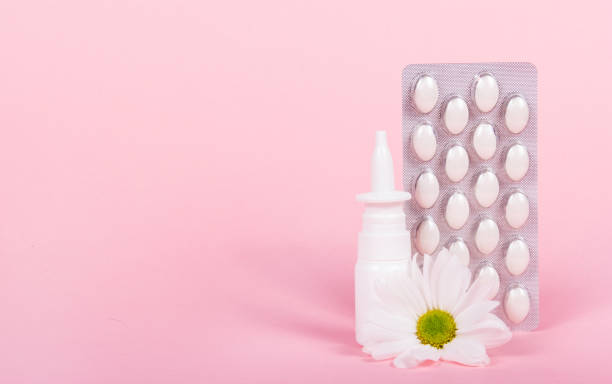istock Nose spray and pills. Allergy and illness. Nasal drops. Copy space 1146113052