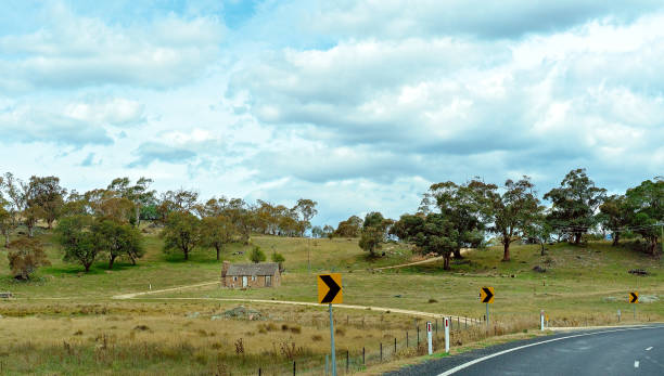 istock Old Stone Cottage Beside Road 1146115414