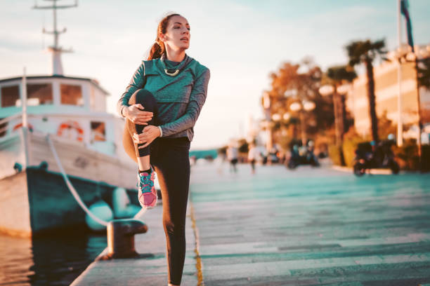 istock Exercising woman outdoors 1146116588
