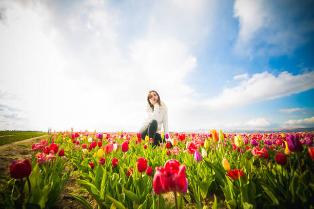istock young model in a field of tulips 1146116664