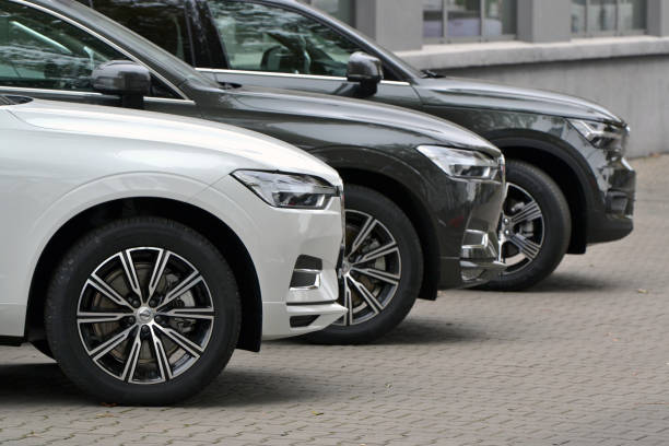 Berlin, Germany - October 5th, 2018: Volvo vehicles stopped on the public parking. The Volvo is a Swedish multinational manufacturing company headquartered in Gothenburg. Since 2010 it has been owned by the Geely Holding Group, China's multinational automotive manufacturing company.