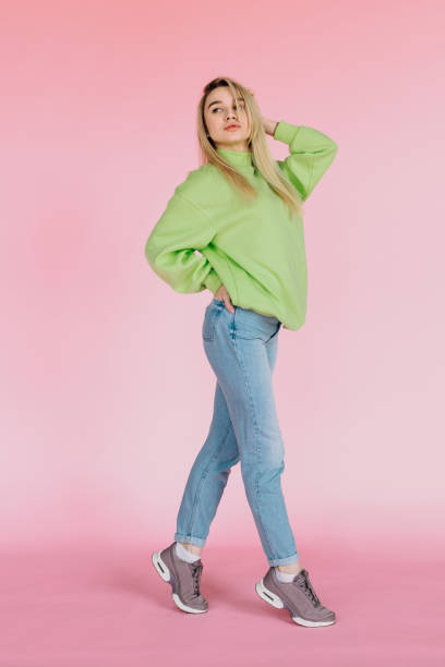 istock Colorful girl on a pink background 1146119829
