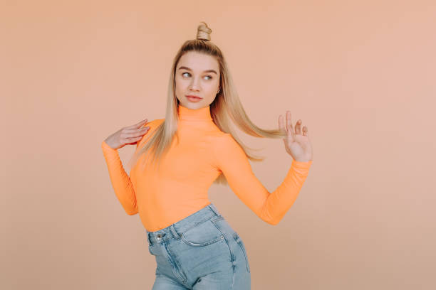 istock Colorful girl on a beige background 1146119901