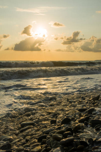 istock Amazing sea sunset, the sun, waves, clouds 1146122300