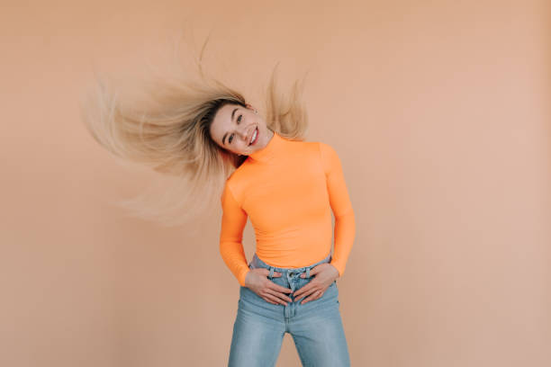 istock Colorful girl on a beige background 1146127422