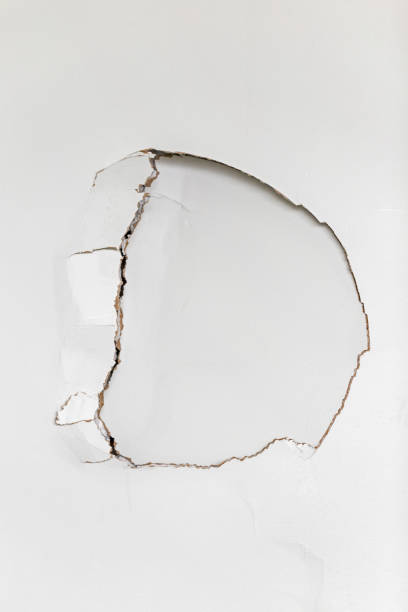 istock Holes in Drywall 1146129512