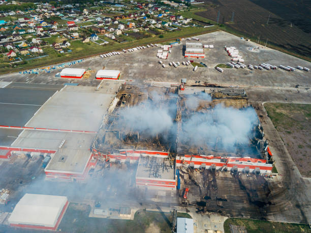 istock Aerial view of burning industrial distribution warehouse 1146131361
