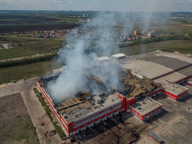 istock Aerial view of burning industrial distribution warehouse 1146131367