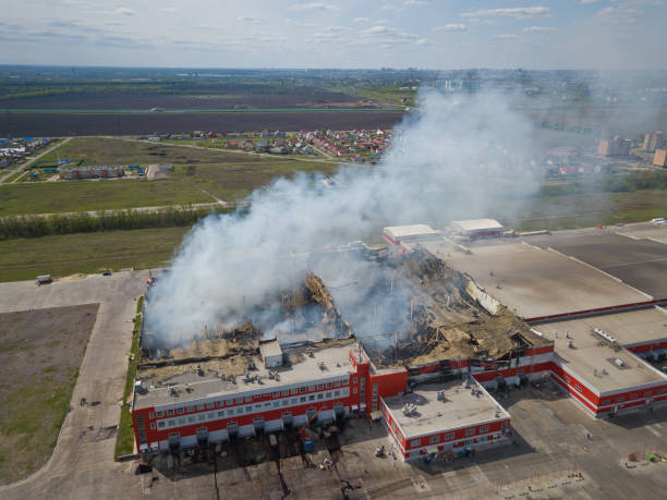 istock Aerial view of burning industrial distribution warehouse 1146131373