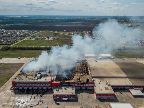 istock Aerial view of burning industrial distribution warehouse 1146131450