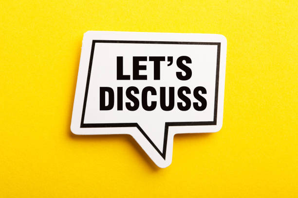 istock Let Us Discuss Speech Bubble Isolated On Yellow Background 1146135405