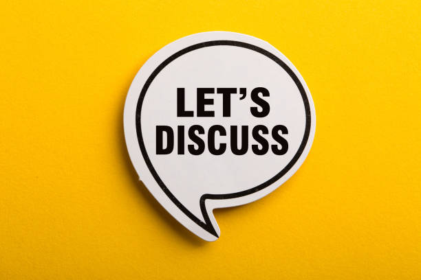 istock Let Us Discuss Speech Bubble Isolated On Yellow Background 1146135425