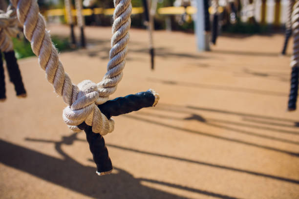 istock Close-up rope knot line tied together with playground background.selective focus. 1146136479