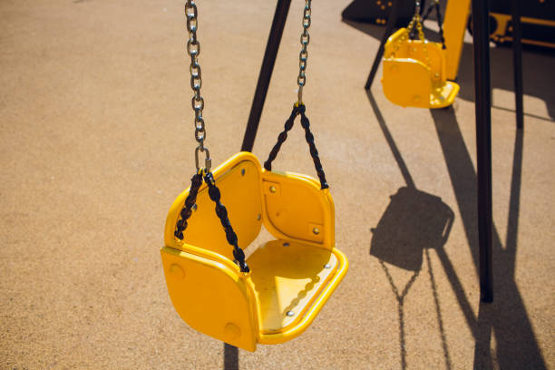 istock Empty chain swing swings in children playground. 1146136565