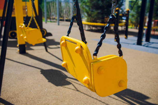istock Empty chain swing swings in children playground. 1146136577