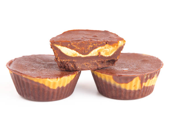 Homemade Chocolate Peanut Butter Cups on a White Background