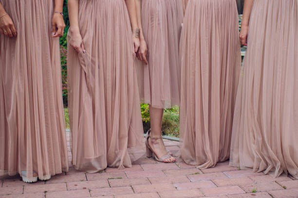 istock Glorious bridesmaids in pink dresses 1146137646