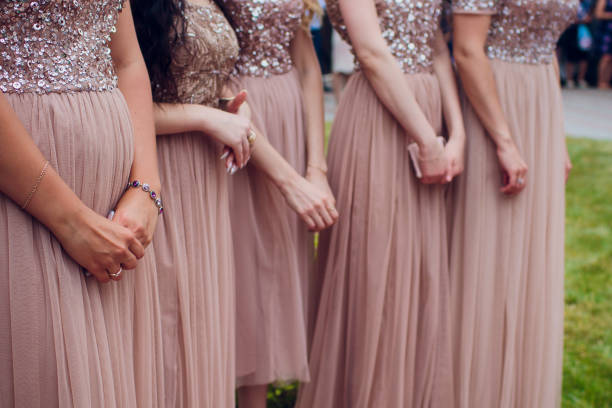 istock Glorious bridesmaids in pink dresses 1146137657