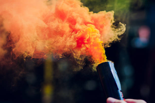 istock colorful red smoke bombs in action 1146137740