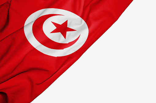 Tunisia flag of fabric with copyspace for your text on white background