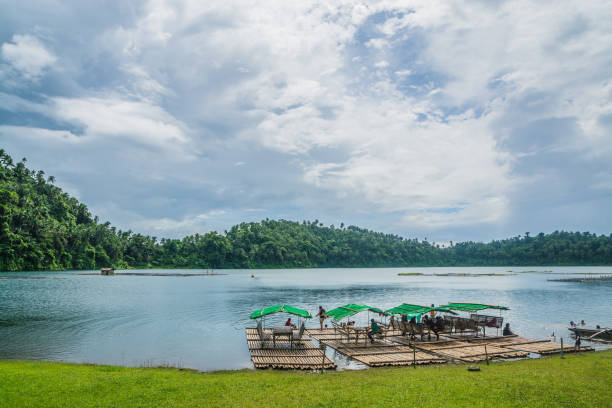 istock bamboo rafts on the beach of Yambo Lake 1146143484