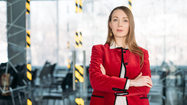 istock confident business woman arms folded top coach 1146143790