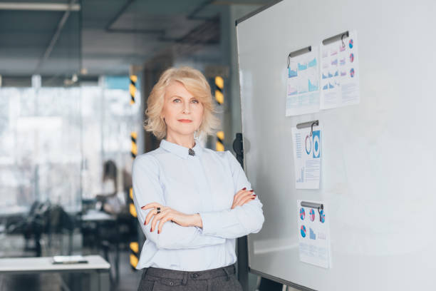 confident business woman arms folded top coach