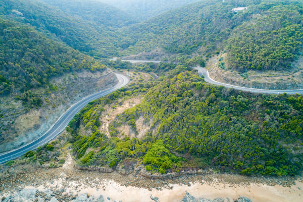 istock Great Ocean Road bends through hills near the coastline 1146143874