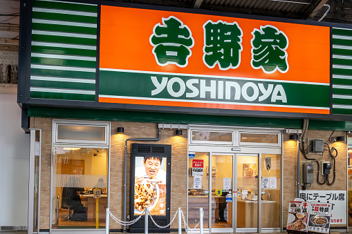 Tokyo, Japan - March 21, 2019: One of the Yoshinoya restaurant in Tokyo, Japan. Yoshinoya is a Japanese multinational fast food chain, and the second-largest chain of gyūdon (beef bowl) restaurants.