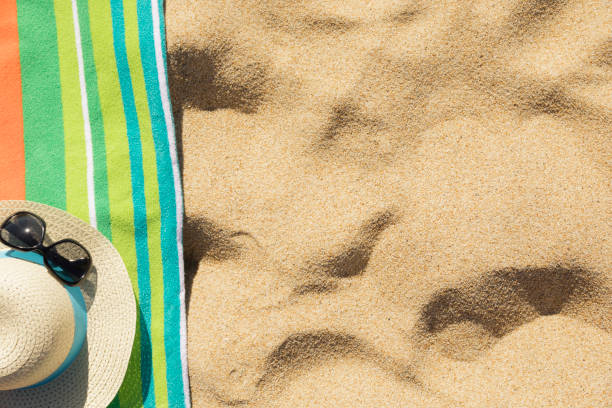 istock Beach towel on sandy tropical beach 1146159003