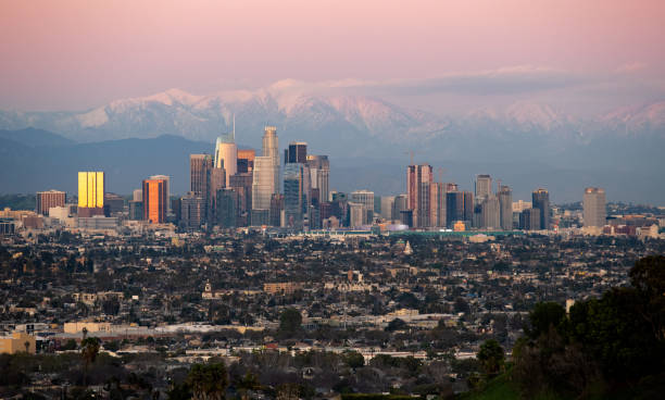 istock Los Angeles City Scape With Snowy Mountains 1146162068