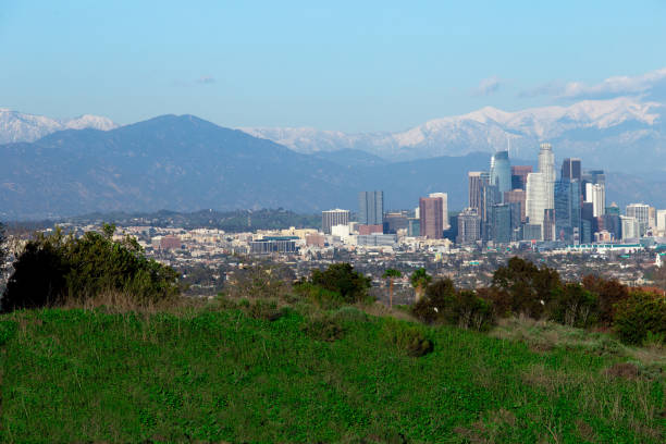 istock Los Angeles City Scape With Snowy Mountains 1146162082