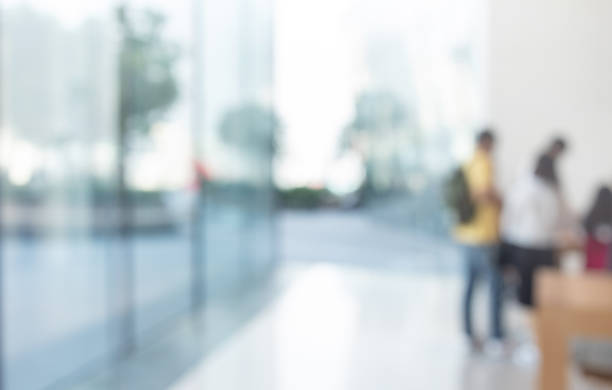istock Blurred abstract glass wall from building in city town 1146162654