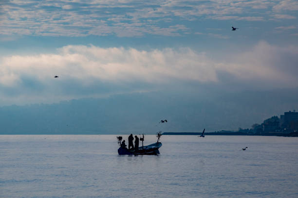 istock sunrise fishermen 1146170248