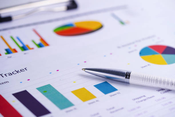 istock Charts Graphs spreadsheet paper. Financial development, Banking Account, Statistics, Investment Analytic research data economy, Stock exchange trading, Business office company meeting concept. 1146170788