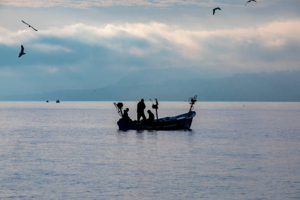 istock sunrise fishermen 1146170814
