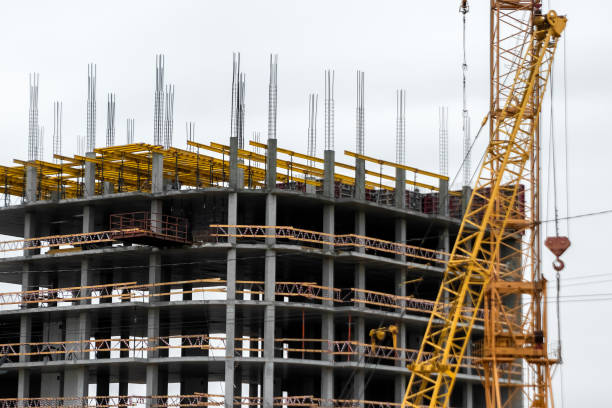 istock Building construction on monolithic technology. Construction of the building. Concrete frame of the building. 1146171646
