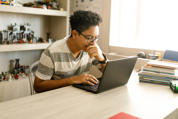 istock Teenage boy surfing on internet 1146172791