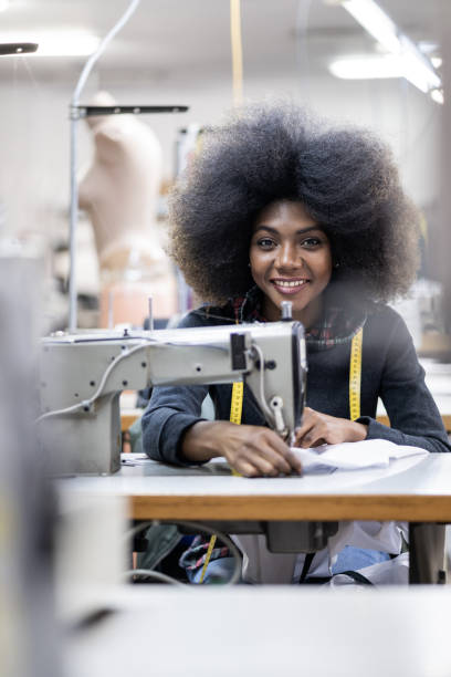 istock African worker in fashion factory using sewing machine 1146176277