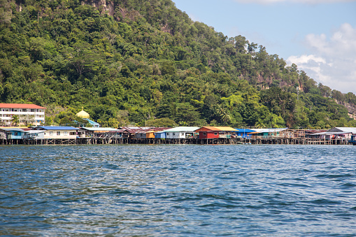 Houses on stilts make up the Sim Sim Water Village near Sandakan, a traditional style of living on the coast of Borneo.